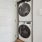 Linen closet with stacked washer and dryer combo