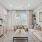 A living room with a couch and table