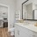 Bathroom with quartz countertop and walk in closet