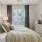 Bedroom with bed and dresser