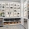 Cabinets with dishes and a coffee machine
