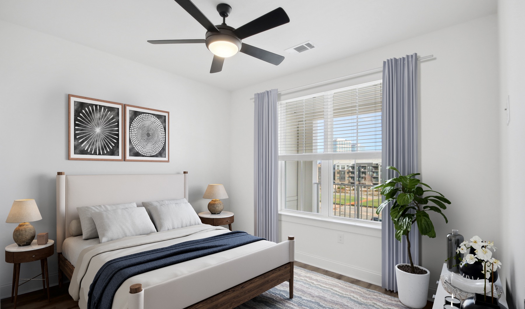 a bedroom with a bed and ceiling fan
