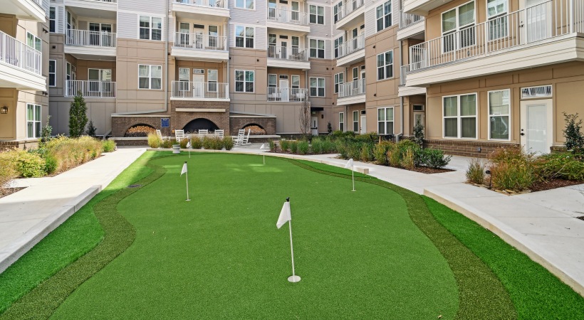 Putting Green course with grass and flags for the holes